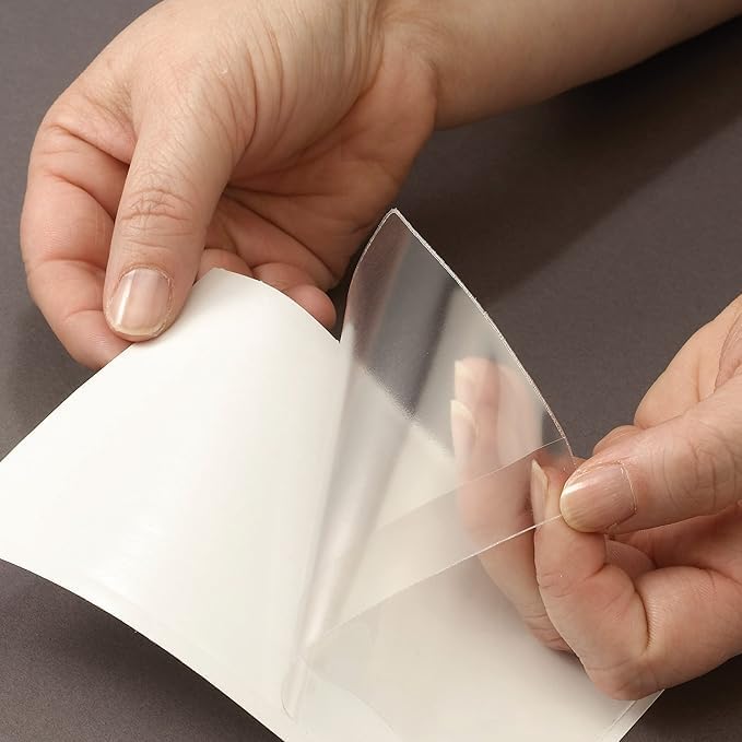 Tarifold Self-Adhesive Photo Pockets, 4 Inches x 6 Inches, Clear, 100 Pack | 100 clear polypropylene pockets, 4 inches x 6 inches, self-adhesive backing, protects photos and cards, top-loading