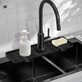 Silicone Faucet Mat for Kitchen Sink – Gen 3 10° Slope Splash Guard with Cuttable Hole – 14” x 5.5” Drip Catcher & Sponge Holder for Kitchen, Bathroom (Black)