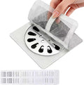 Shower Drain Hair Catcher 30 Pack for Disposable Drain Covers | 4 inch white mesh, bathroom sink strainer, bathtub water filter, waterproof adhesive backing, kitchen laundry plug hole
