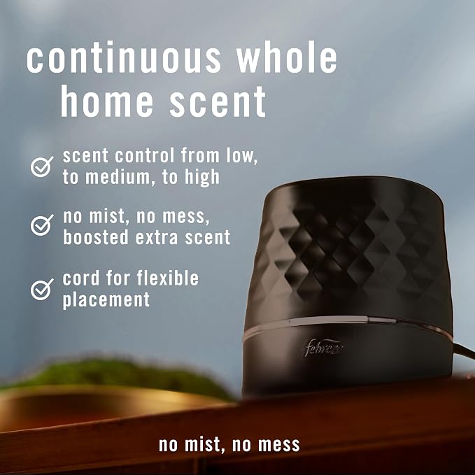 Febreze Plug in Scent Booster Air Freshener Oil Diffuser Black | Black Plug-in oil diffuser. Boosts scent for 40 mins. Long cord for flexible placement. Fits every home. Starter kit only.