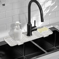 Silicone Faucet Mat for Kitchen Sink – Gen 3 10° Slope Splash Guard with Cuttable Hole – 14” x 5.5” Drip Catcher & Sponge Holder for Kitchen, Bathroom (White)