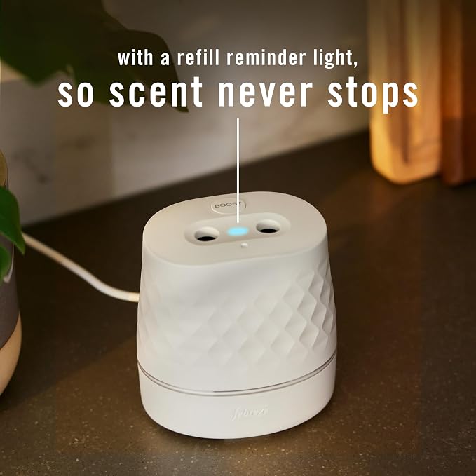 Febreze Plug Scent Booster Starter Kit, Oil Diffuser, Air Freshener Plug in, Continuous Scent, 2 Devices + 2 Baked Cinnamon Apple Refill