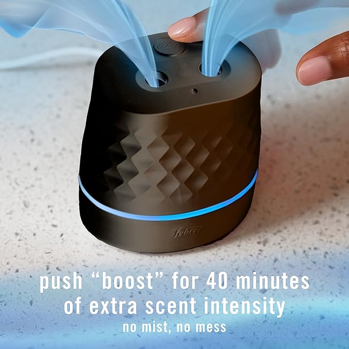 Febreze Plug in Scent Booster Air Freshener Oil Diffuser Black | Black Plug-in oil diffuser. Boosts scent for 40 mins. Long cord for flexible placement. Fits every home. Starter kit only.