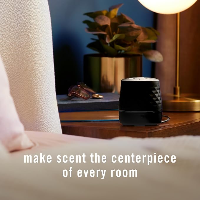 Febreze Plug in Scent Booster Air Freshener Oil Diffuser Black | Black Plug-in oil diffuser. Boosts scent for 40 mins. Long cord for flexible placement. Fits every home. Starter kit only.